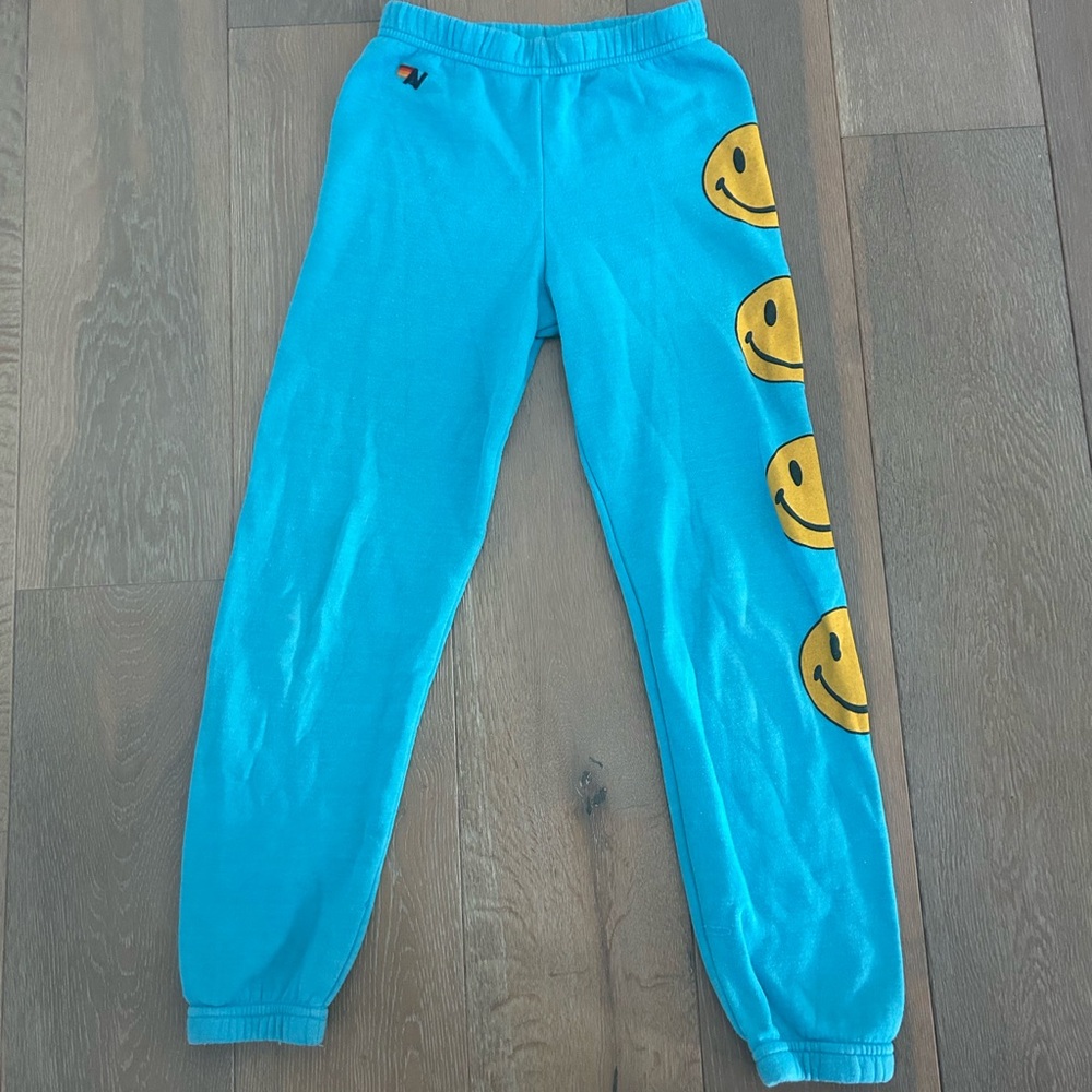 Aviator Nation blue smiley face sweatpants